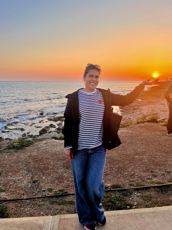 Ksenia by the sea at sunset