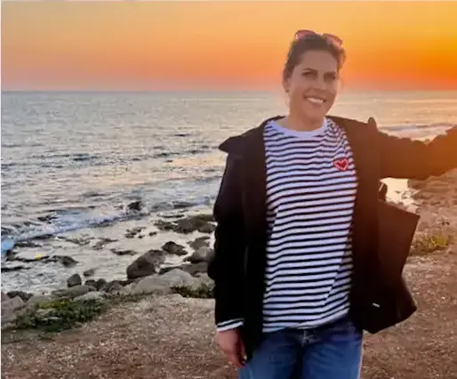 Ksenia by the sea at sunset